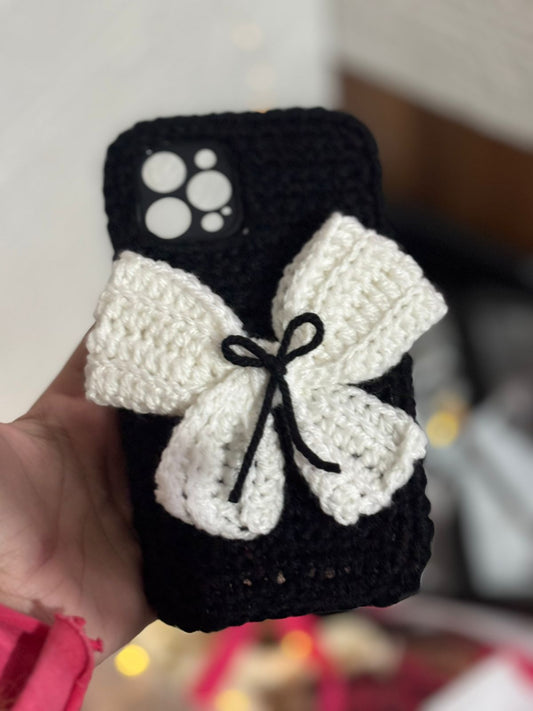 Luxury black handmade crochet phone case with white bow aesthetic design