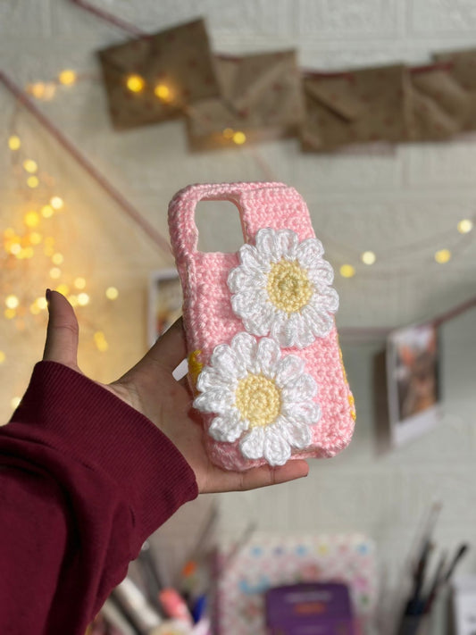 Handmade crochet daisy flower phone case with soft pink wool design