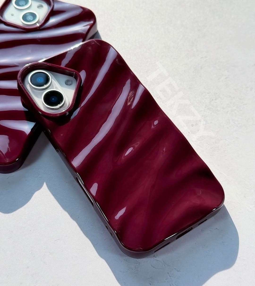 Dark Red Glossy Wave iPhone Case with Luxury Ripple Texture and Premium Finish