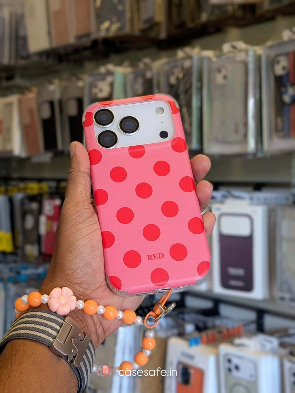 Trendy polka dot phone case with beaded charm for iPhone